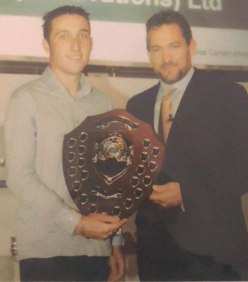 James receiving a plant operator award